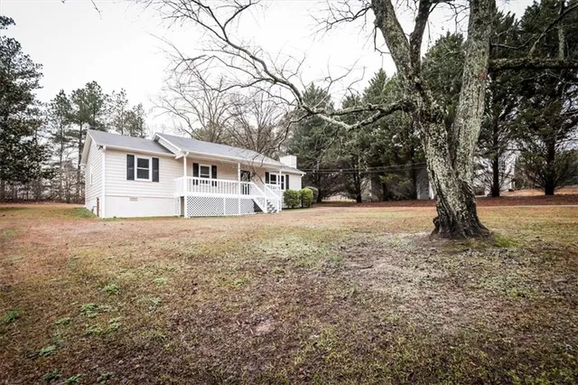 a house with trees in front of it