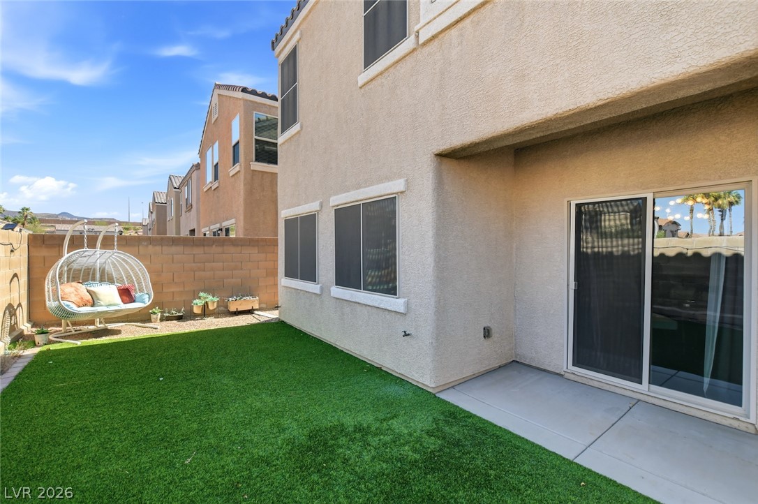 48 Jasmine Point Street Henderson, NV 89074 - Photo 53 of 62 A low-maintenance yard provides a private oasis, perfect for relaxation.