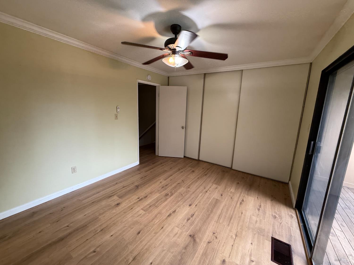 2161 Northwood Circle, Unit C Concord, CA 94520 - Photo 16 of 19 wooden floor in an empty room with a window