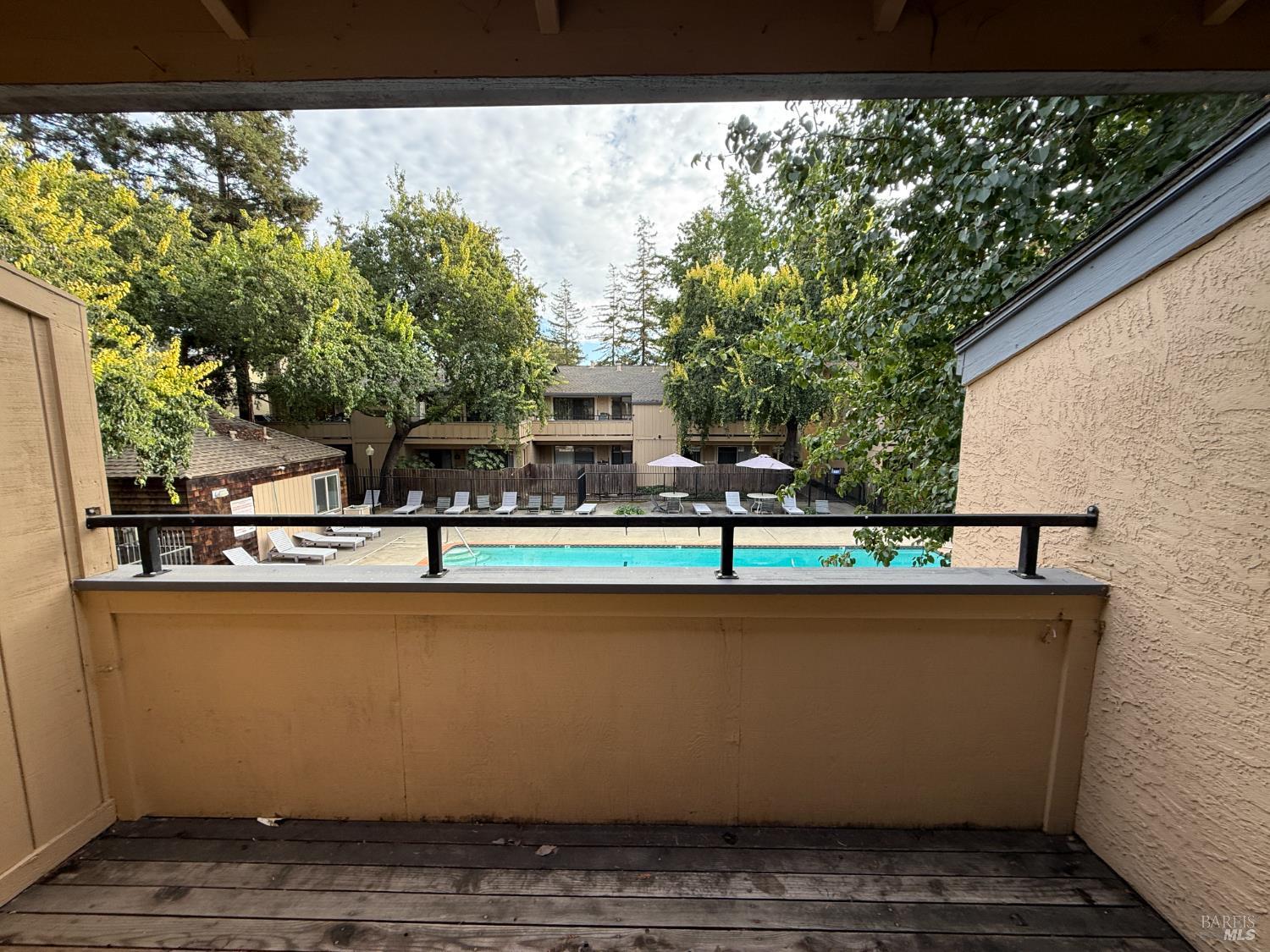 2161 Northwood Circle, Unit C Concord, CA 94520 - Photo 17 of 19 a view of swimming pool with outdoor space and seating area