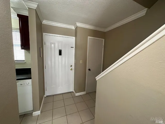 a view of an entryway and hallway