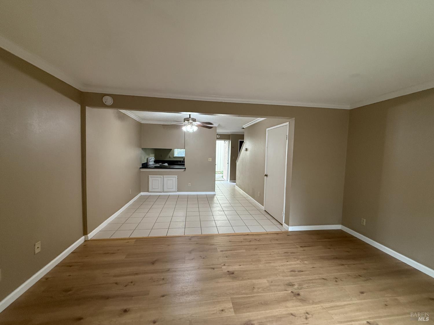 2161 Northwood Circle, Unit C Concord, CA 94520 - Photo 9 of 19 a view of a hallway with wooden floor
