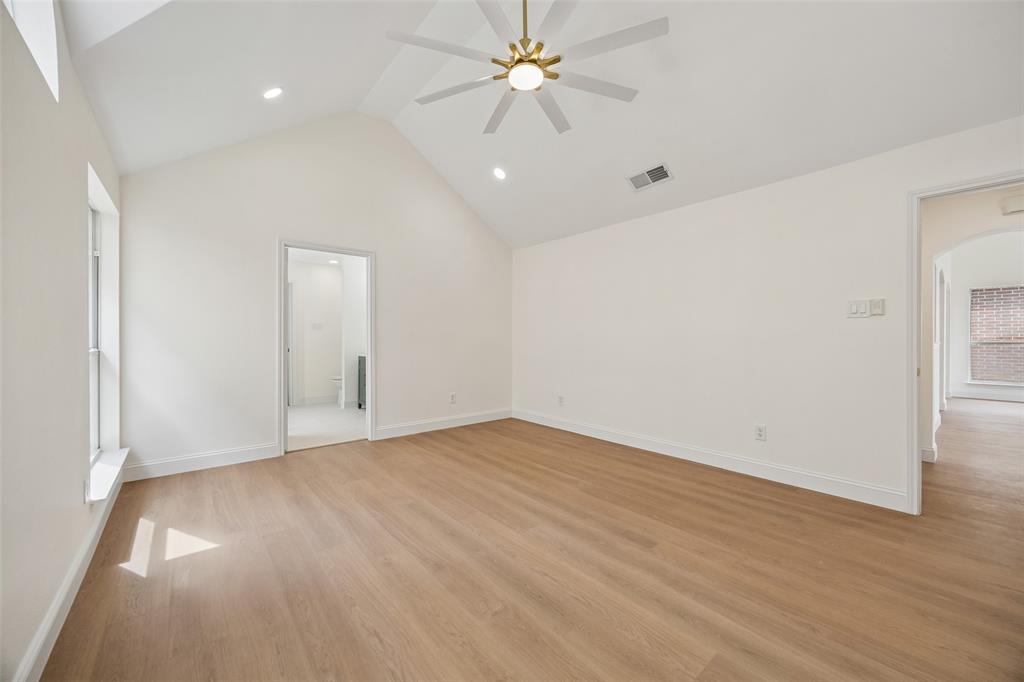 819 Kipling Drive Allen, TX 75002 - Photo 13 of 29 wooden floor in an empty room with a window