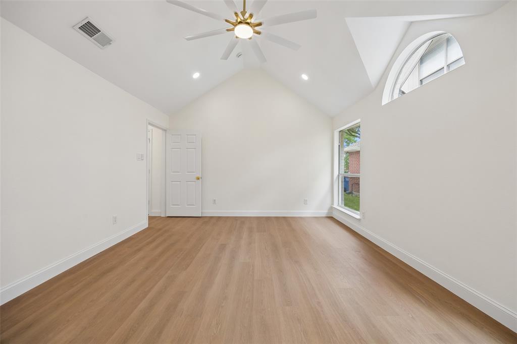 819 Kipling Drive Allen, TX 75002 - Photo 15 of 29 wooden floor in an empty room with a window