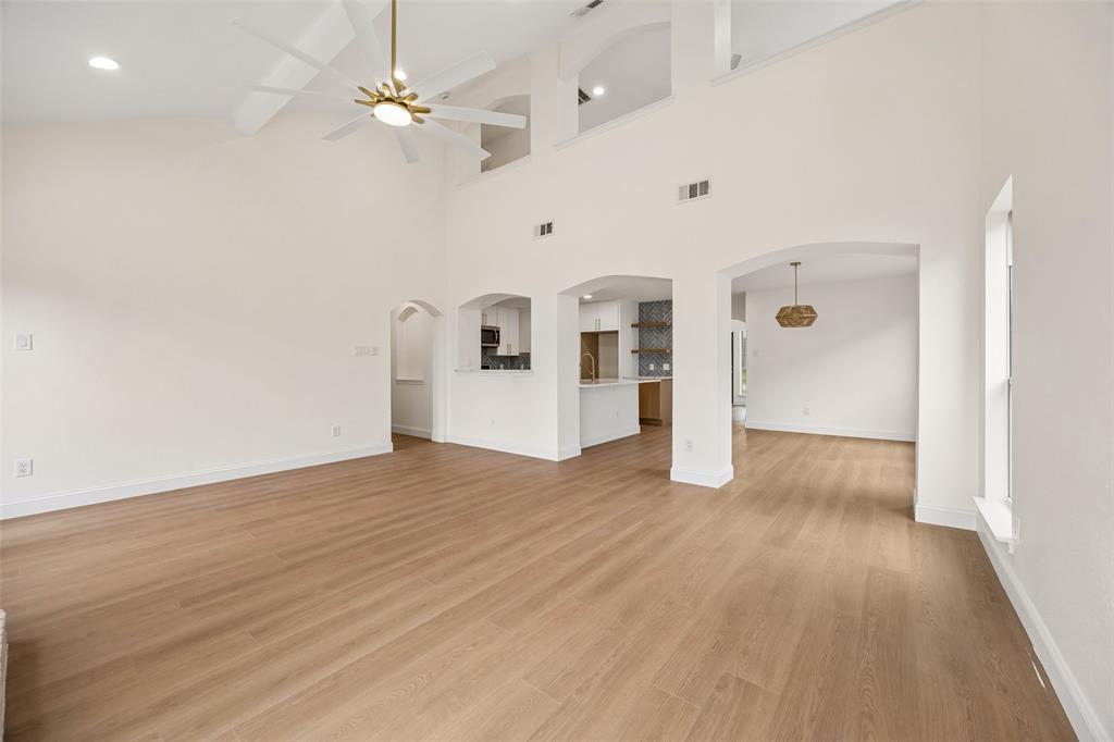 819 Kipling Drive Allen, TX 75002 - Photo 7 of 29 a view of a livingroom with wooden floor