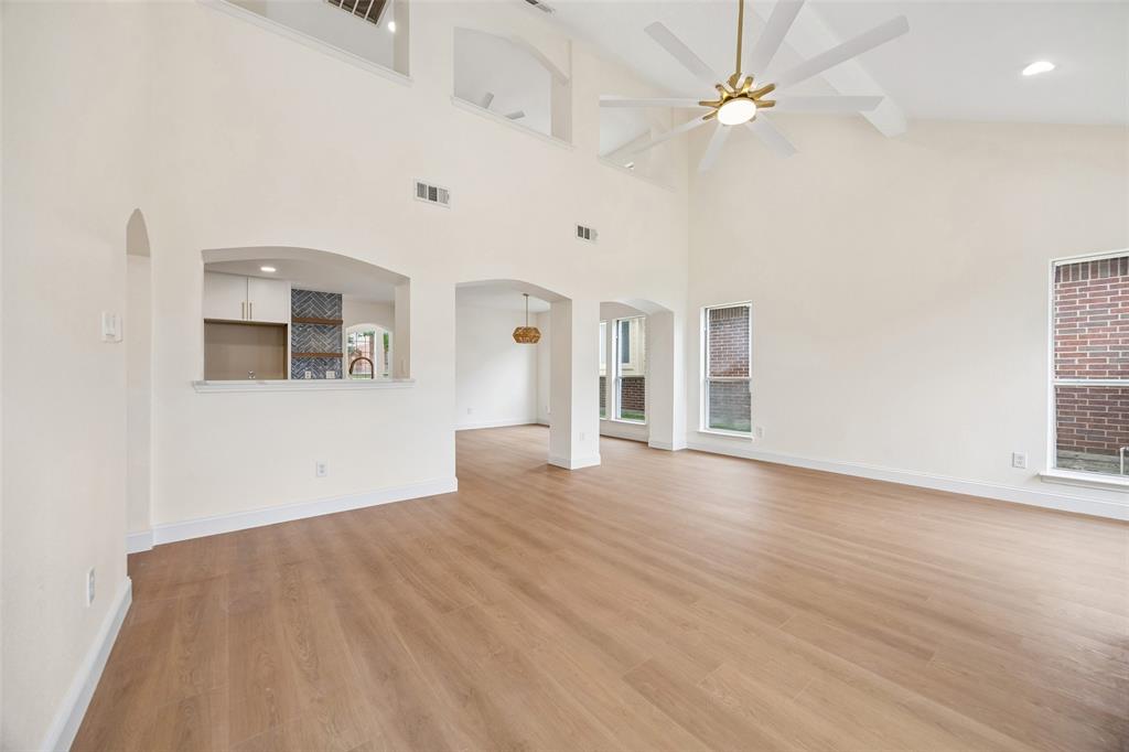819 Kipling Drive Allen, TX 75002 - Photo 8 of 29 wooden floor in an empty room with a window
