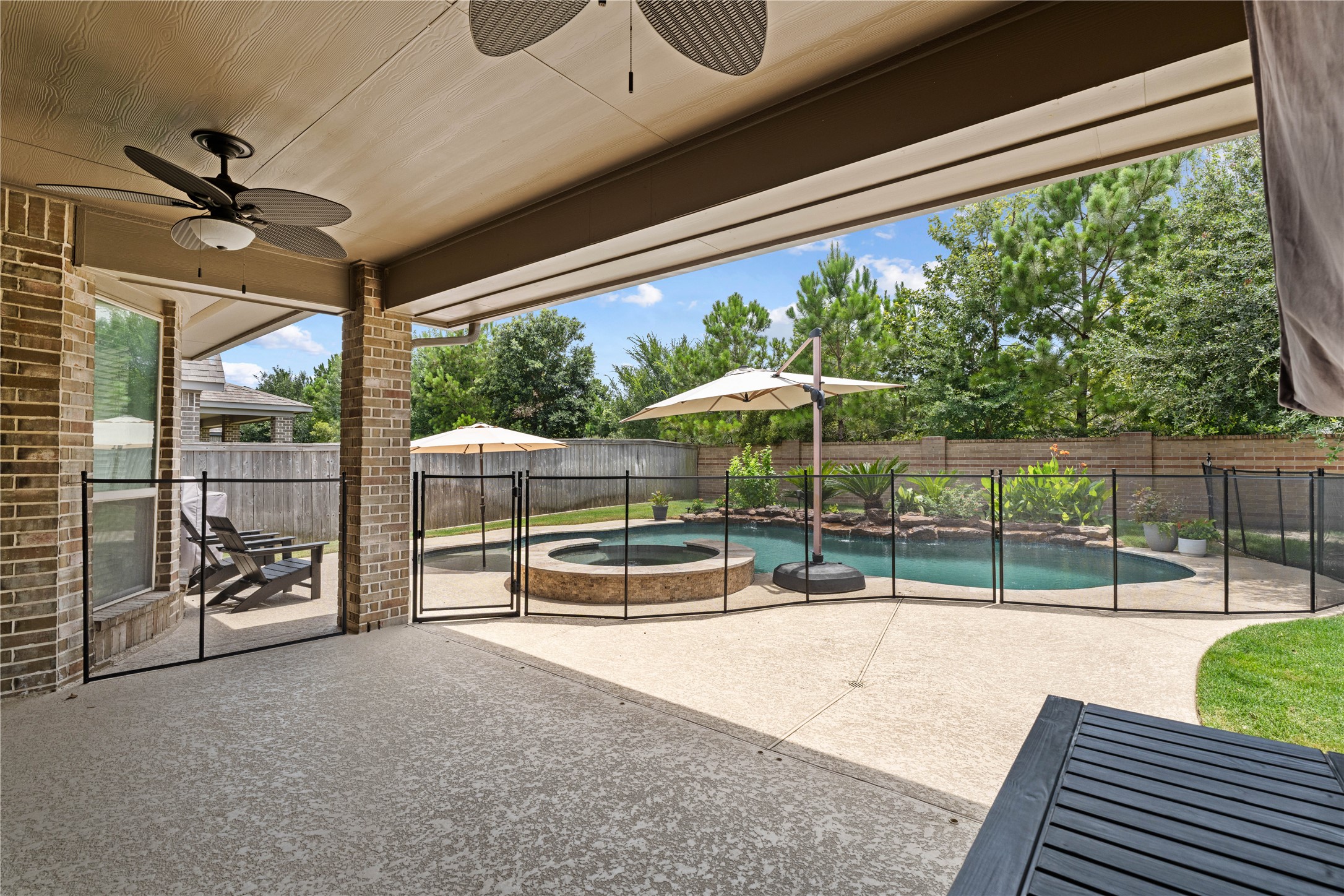 19719 Raccoon Holw Way Cypress, TX 77433 - Photo 38 of 44 Pool is fenced for kid's safety but can easily be removed