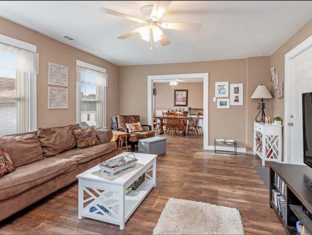 3 Orchard Street, Unit B Millbury, MA 01527 - Photo 17 of 17 a living room with furniture and wooden floor