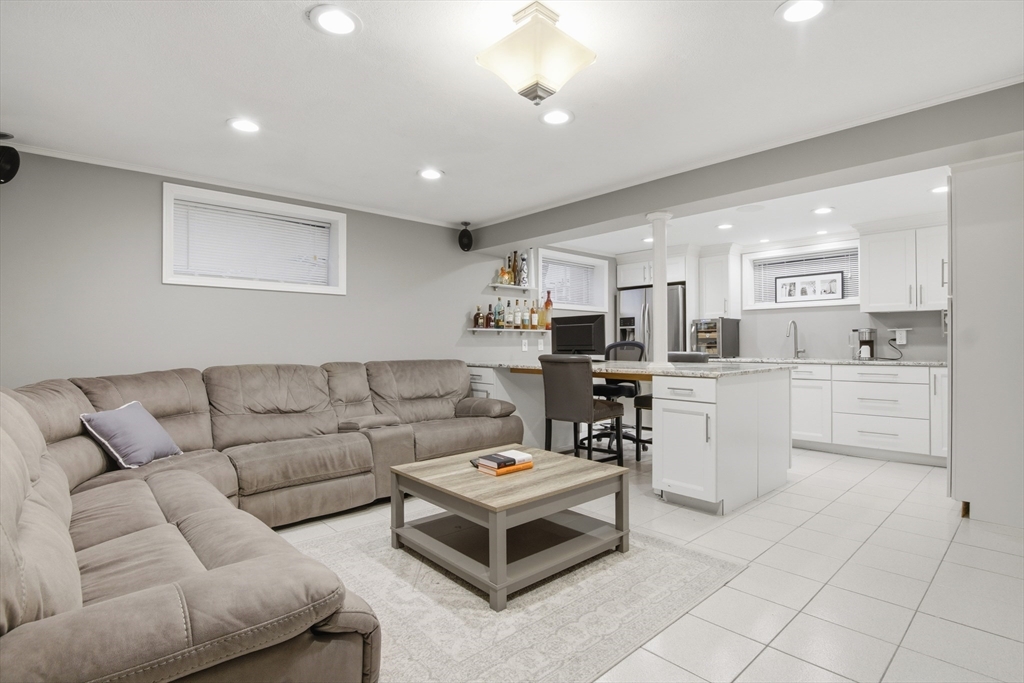 64 Browning Road Arlington, MA 02476 - Photo 17 of 25 a living room with furniture and kitchen view