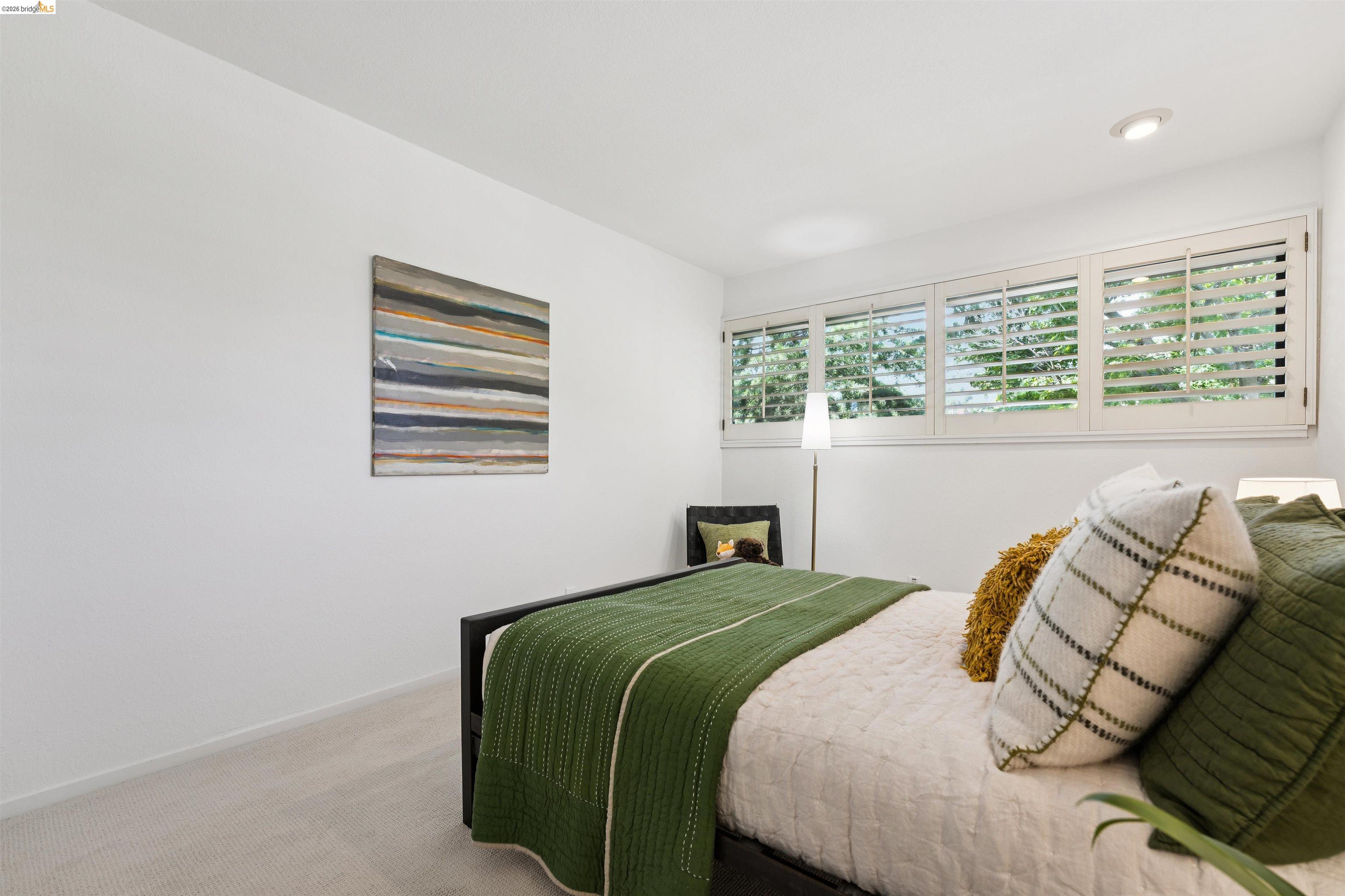 7 Jo Lin Court El Sobrante, CA 94803 - Photo 64 of 99 Wall-to-wall carpeting and white walls complement the recessed ceiling lighting