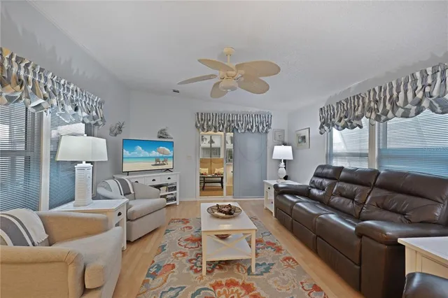 a kitchen with stainless steel appliances granite countertop a sink and a microwave
