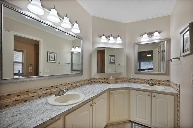 a bathroom with a sink a toilet and bathtub