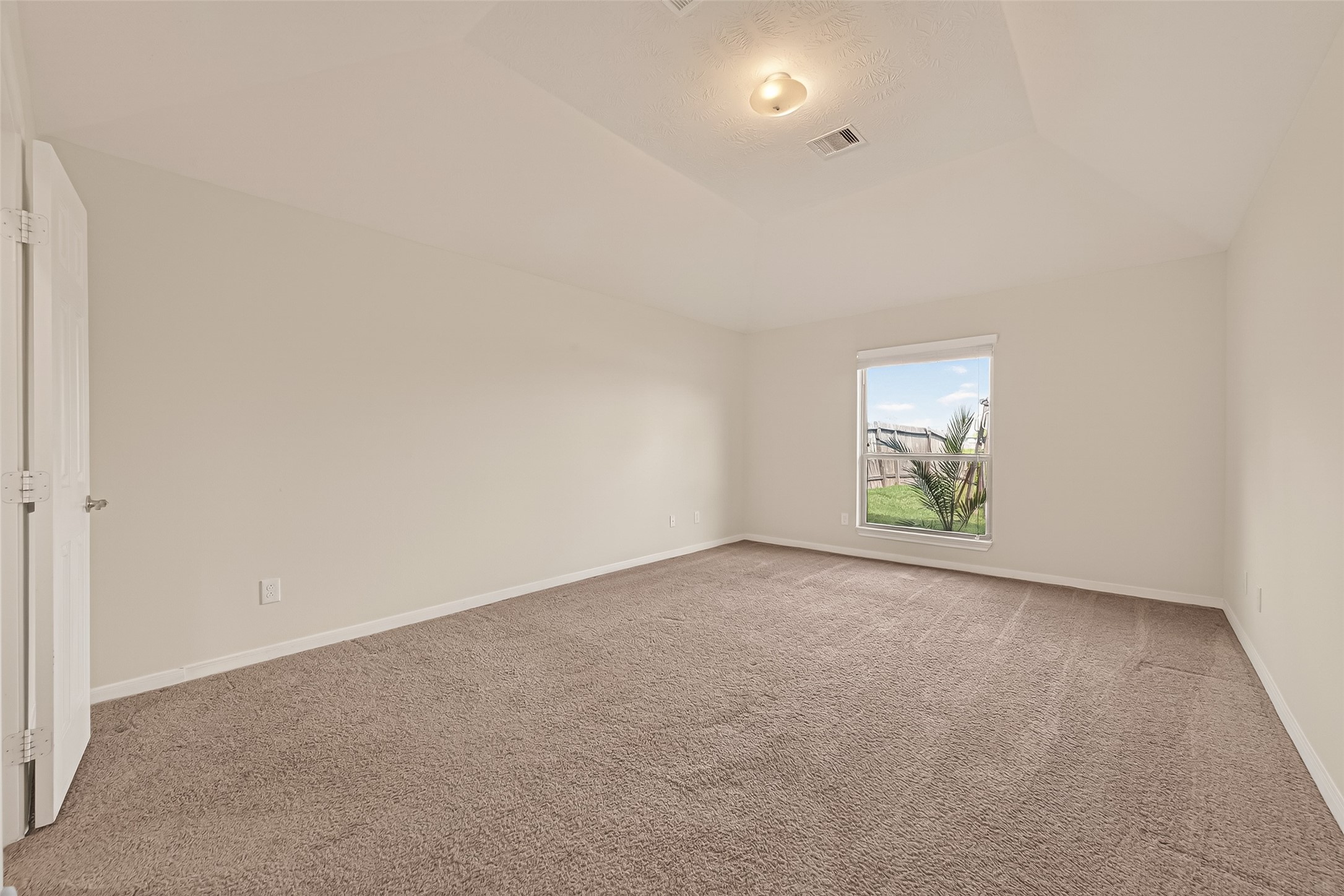 29 Palmero Way Manvel, TX 77578 - Photo 13 of 31 Primary bedroom featuring generous space, natural light, and a peaceful retreat feel.