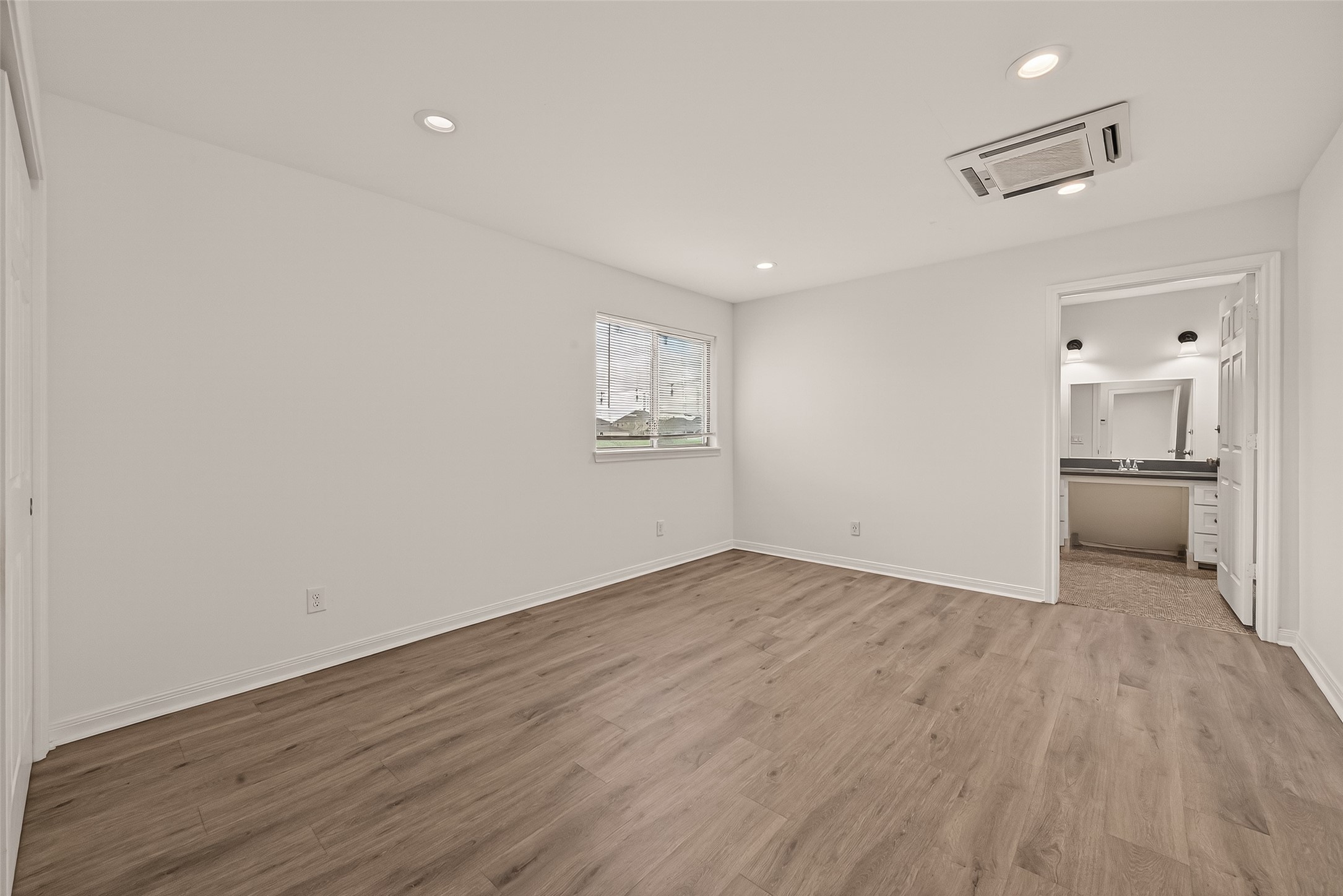 29 Palmero Way Manvel, TX 77578 - Photo 18 of 31 Added bedroom from garage conversion with direct access to a full bath that is ideal for guests or multigenerational living.