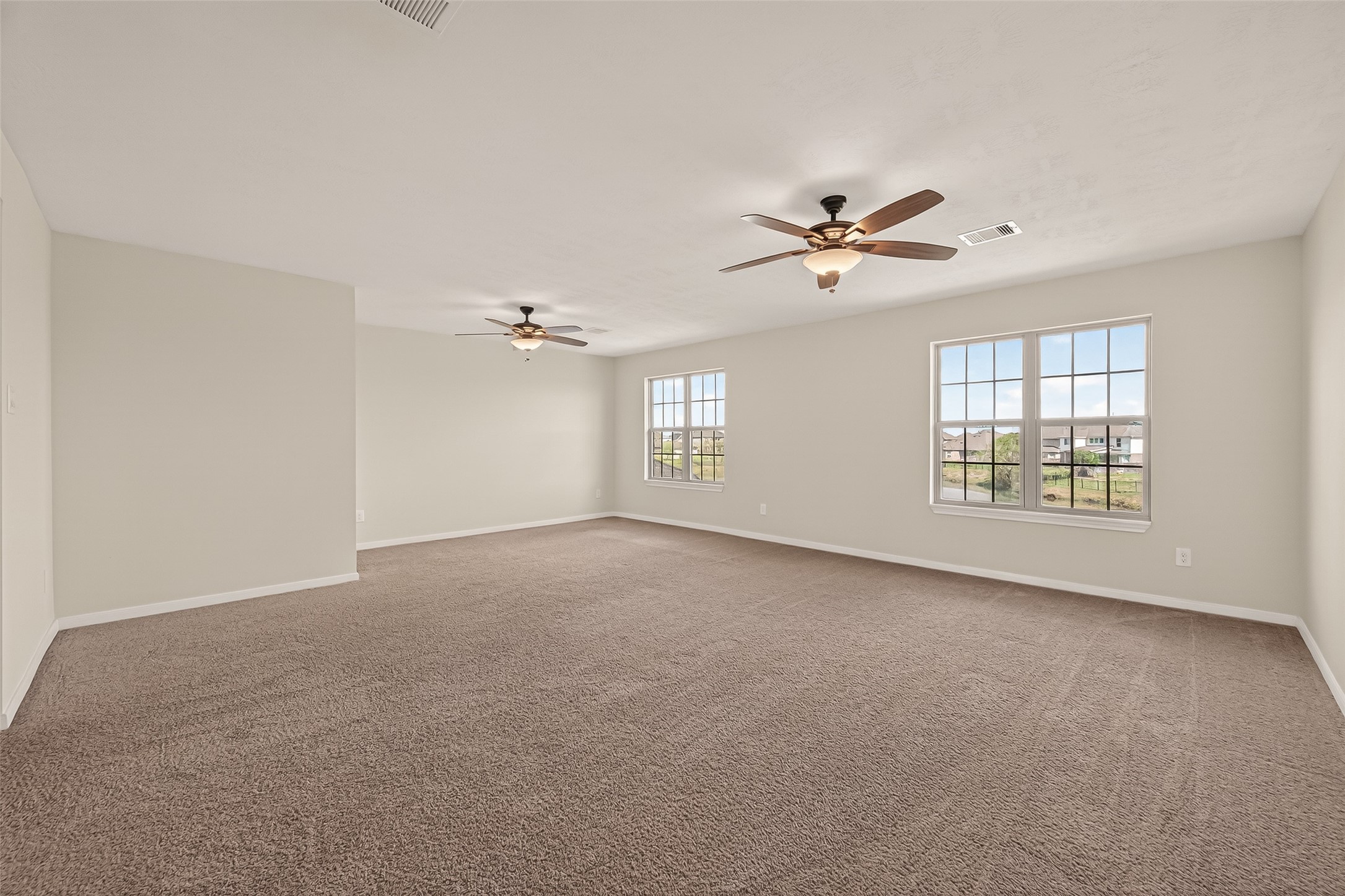 29 Palmero Way Manvel, TX 77578 - Photo 22 of 31 Upstairs flex space ideal for a game room, media room, or play area.