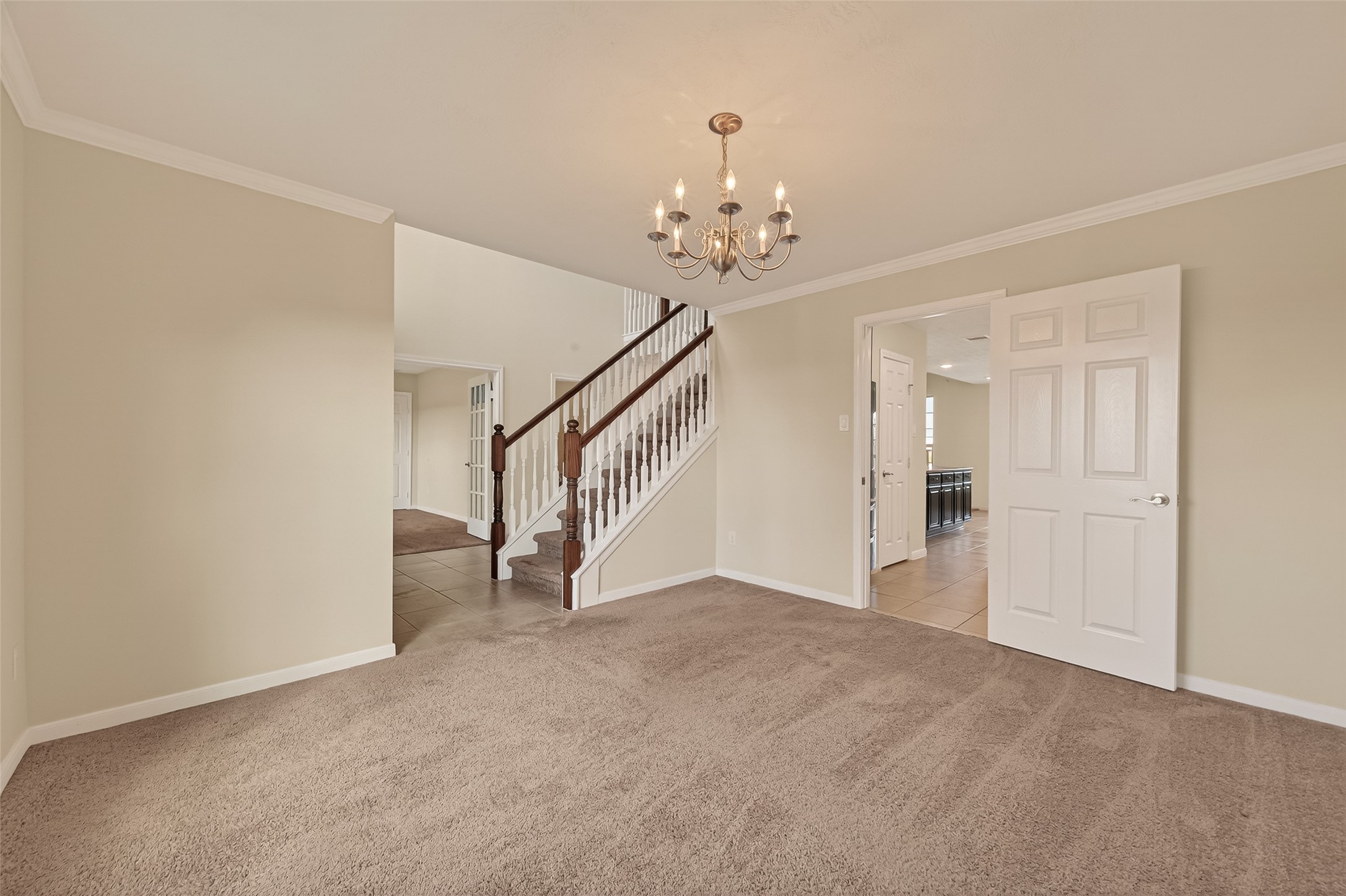 29 Palmero Way Manvel, TX 77578 - Photo 7 of 31 Formal dining room just off the entry, featuring a chandelier and ideal for hosting.