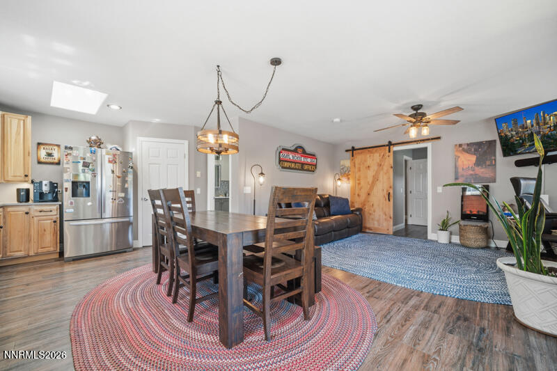 1931 Lousetown Road Reno, NV 89521 - Photo 27 of 51 a view of a dining room with furniture and wooden floor