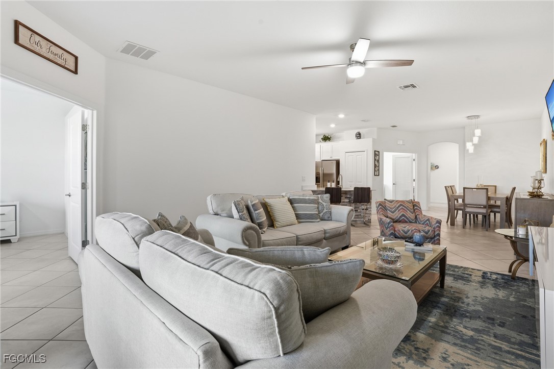 2617 Vine Avenue Naples, FL 34120 - Photo 12 of 27 a living room with furniture