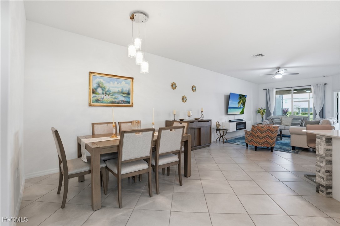2617 Vine Avenue Naples, FL 34120 - Photo 7 of 27 a view of a livingroom with furniture and a window