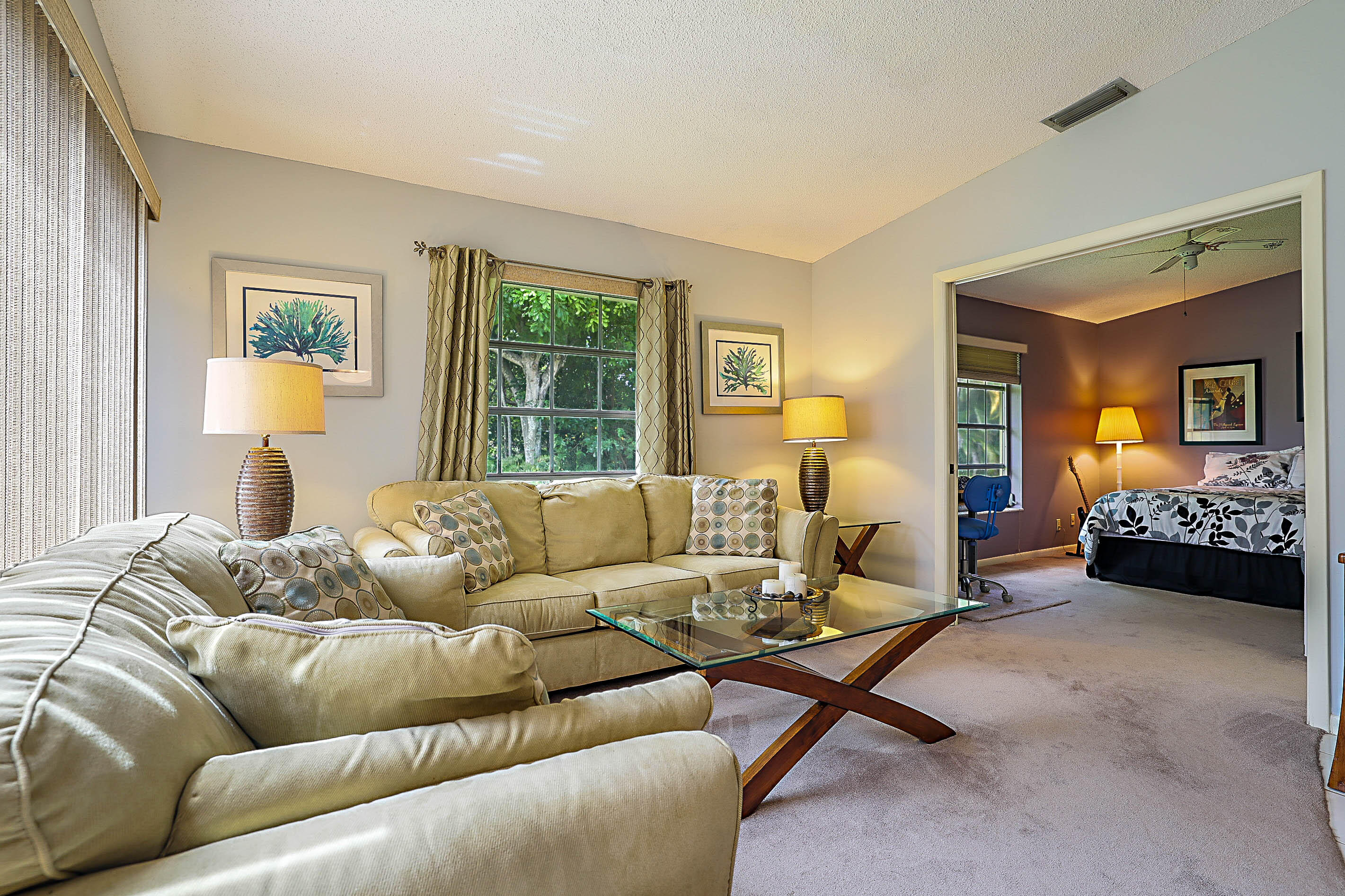 5231 Copperleaf Circle Delray Beach, FL 33484 - Photo 5 of 31 a living room with furniture window and a lamp