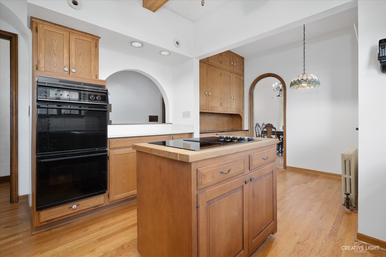 1125 Cedar Avenue Elgin, IL 60120 - Photo 11 of 29 a kitchen with granite countertop a stove and a refrigerator