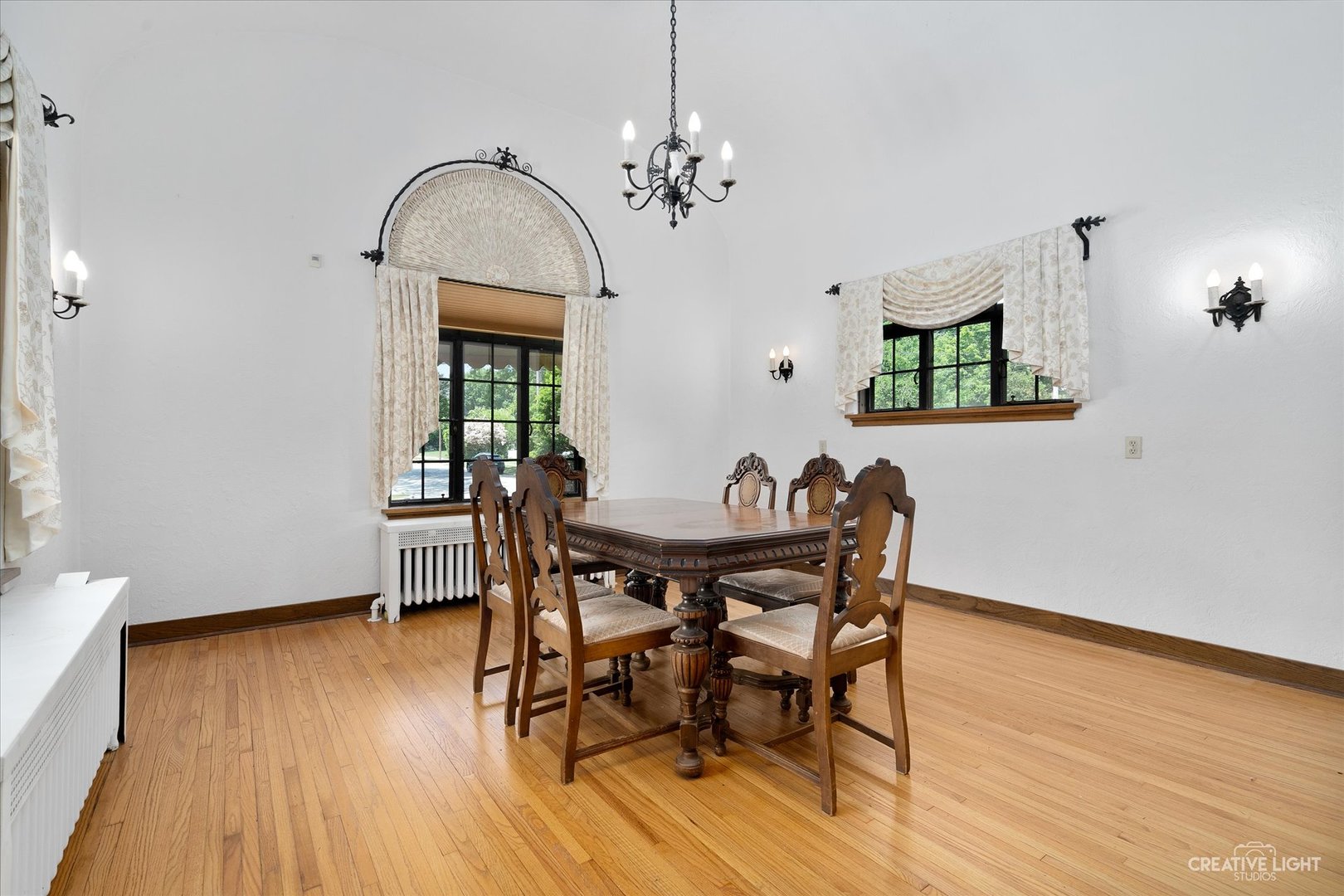 1125 Cedar Avenue Elgin, IL 60120 - Photo 12 of 29 a view of a dining room with furniture and wooden floor