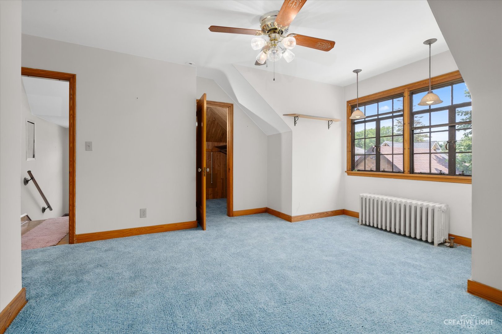 1125 Cedar Avenue Elgin, IL 60120 - Photo 14 of 29 wooden floor in an empty room with a window