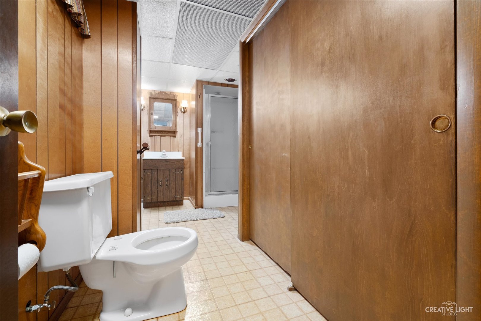 1125 Cedar Avenue Elgin, IL 60120 - Photo 21 of 29 a bathroom with a toilet and a shower