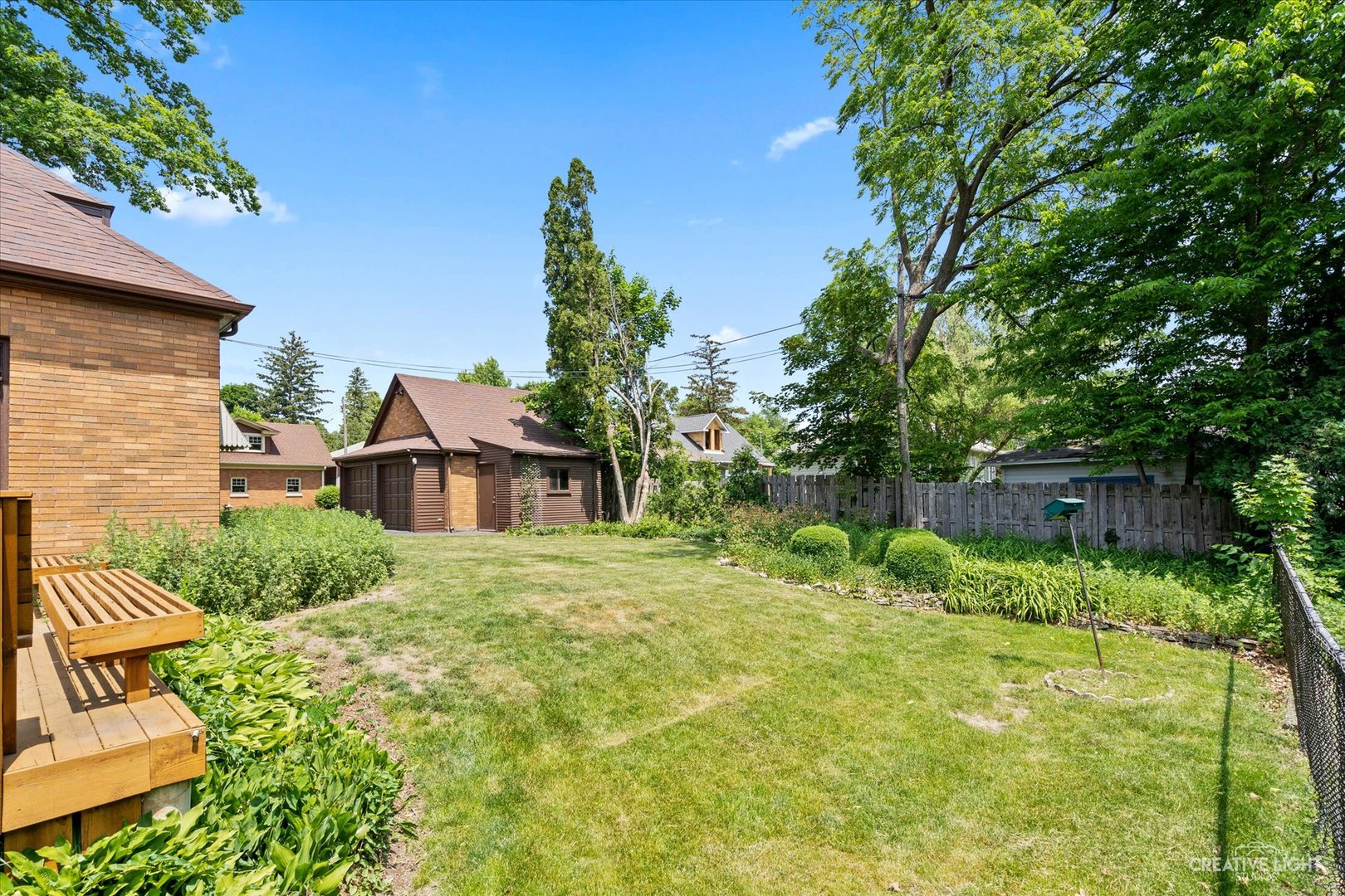 1125 Cedar Avenue Elgin, IL 60120 - Photo 27 of 29 a view of backyard of house with green space