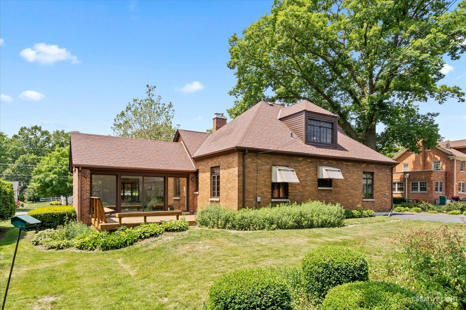 1125 Cedar Avenue Elgin, IL 60120 - Photo 28 of 29 a front view of a house with a yard