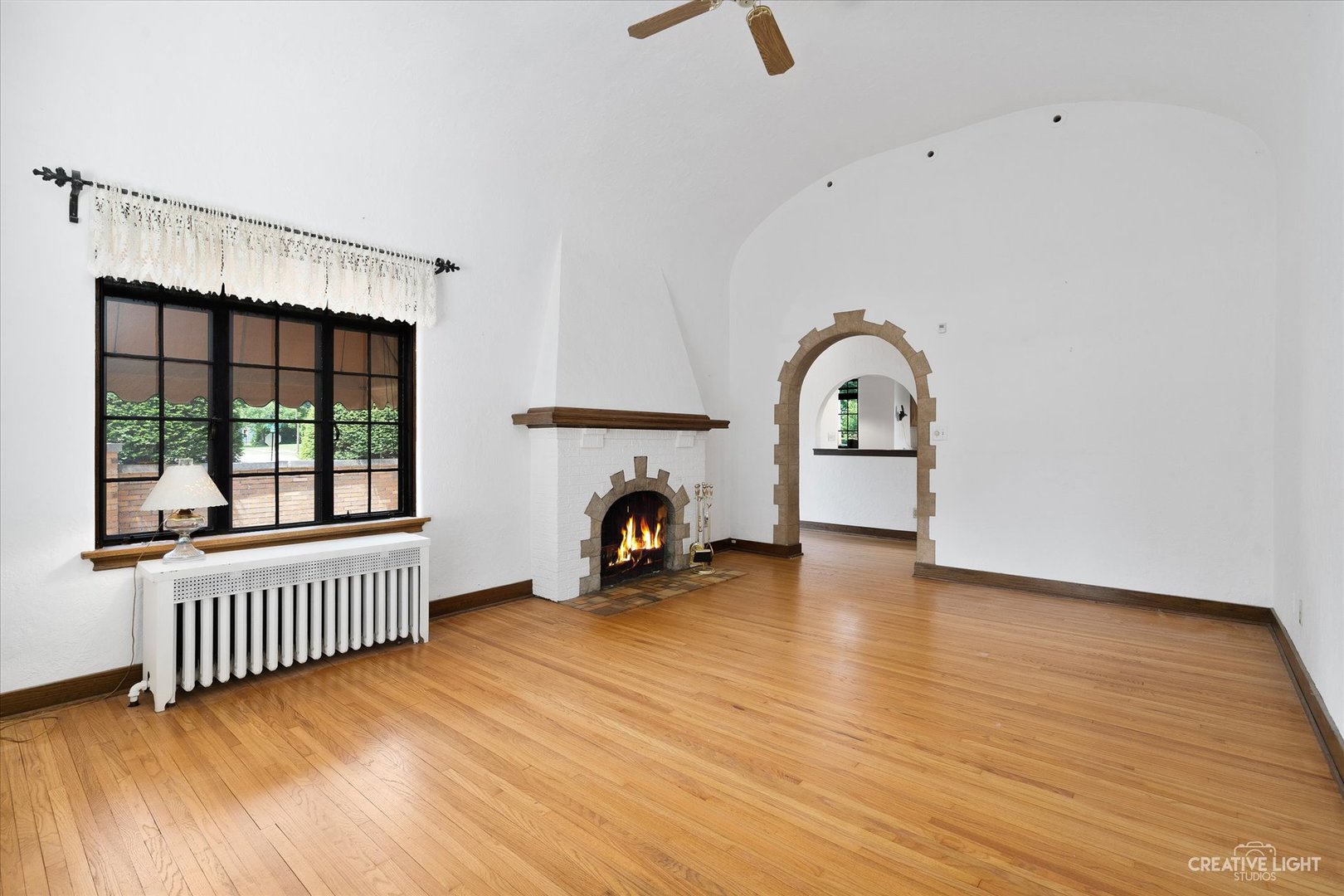 1125 Cedar Avenue Elgin, IL 60120 - Photo 4 of 29 an empty room with window