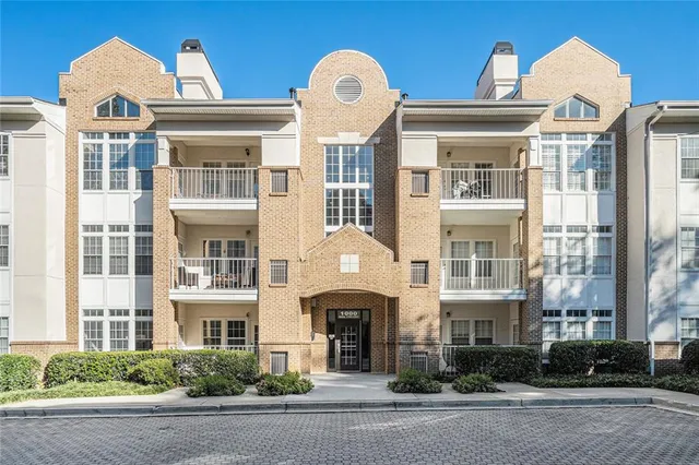 a front view of a multi story residential apartment building