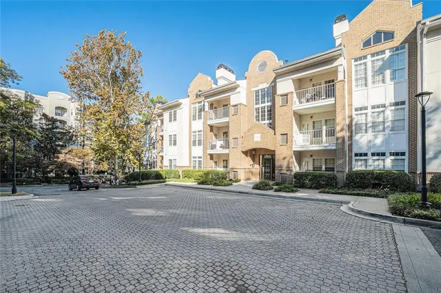 a view of a building and a street