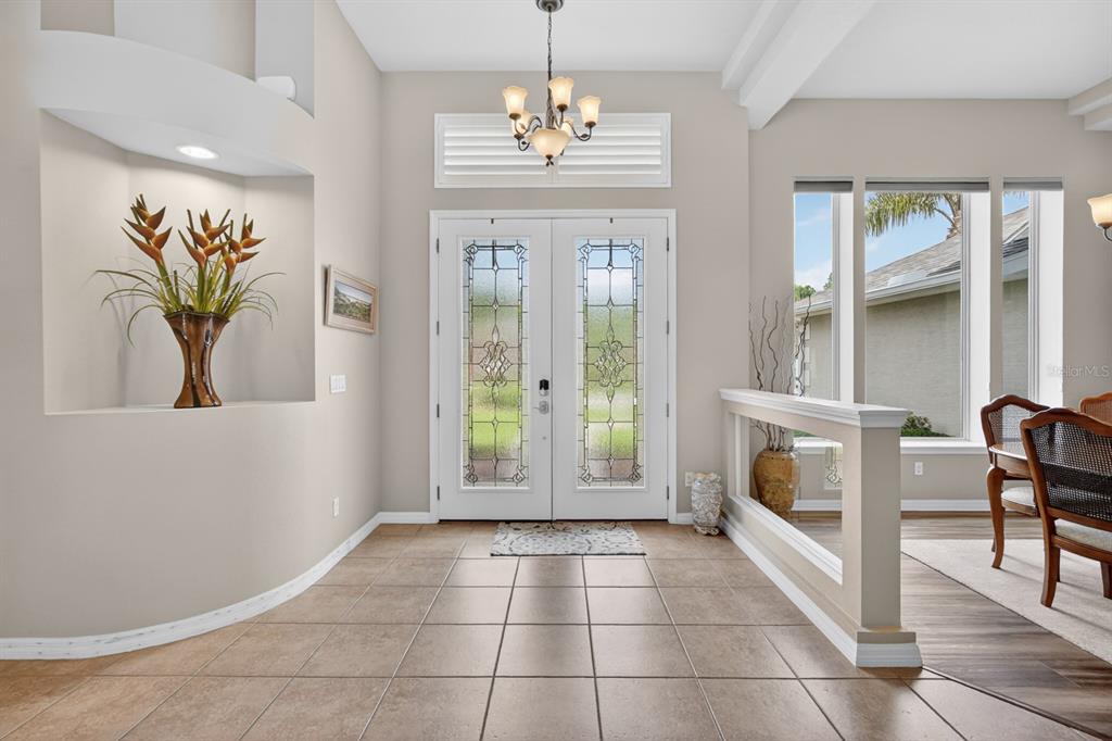 1269 Harwick Lane Ormond Beach, FL 32174 - Photo 3 of 39 a view of a hallway with furniture and a window