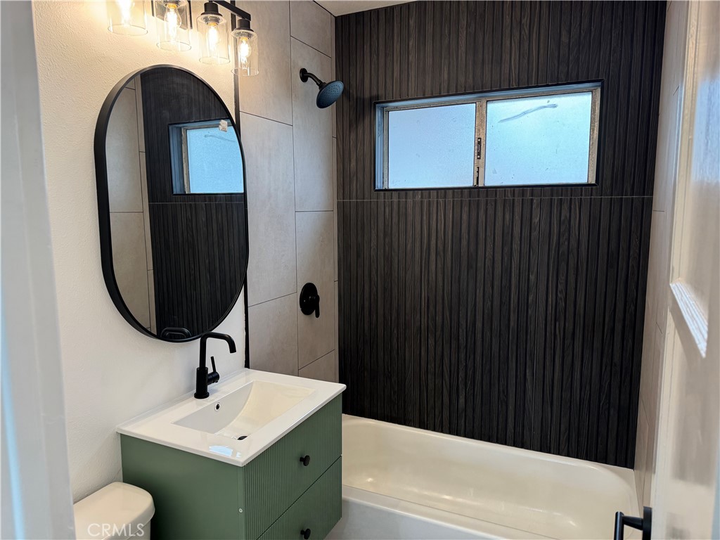 459 Pamela Road Duarte, CA 91010 - Photo 14 of 18 a bathroom with a sink and a mirror