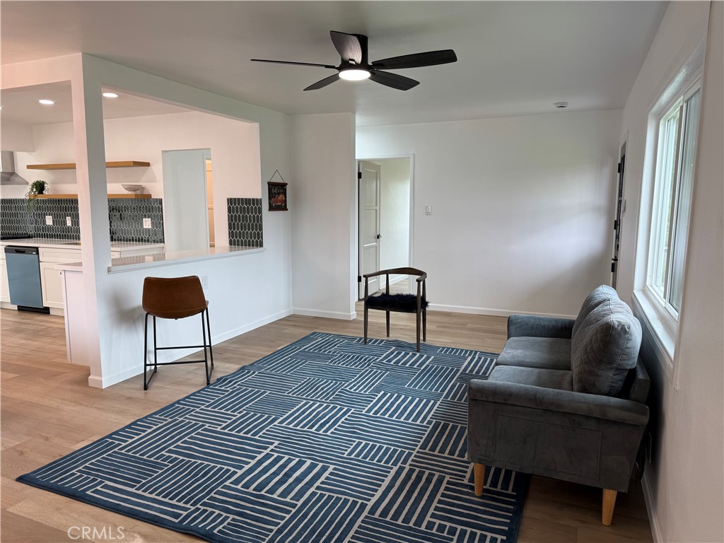 459 Pamela Road Duarte, CA 91010 - Photo 15 of 18 a living room with furniture a rug and a chandelier