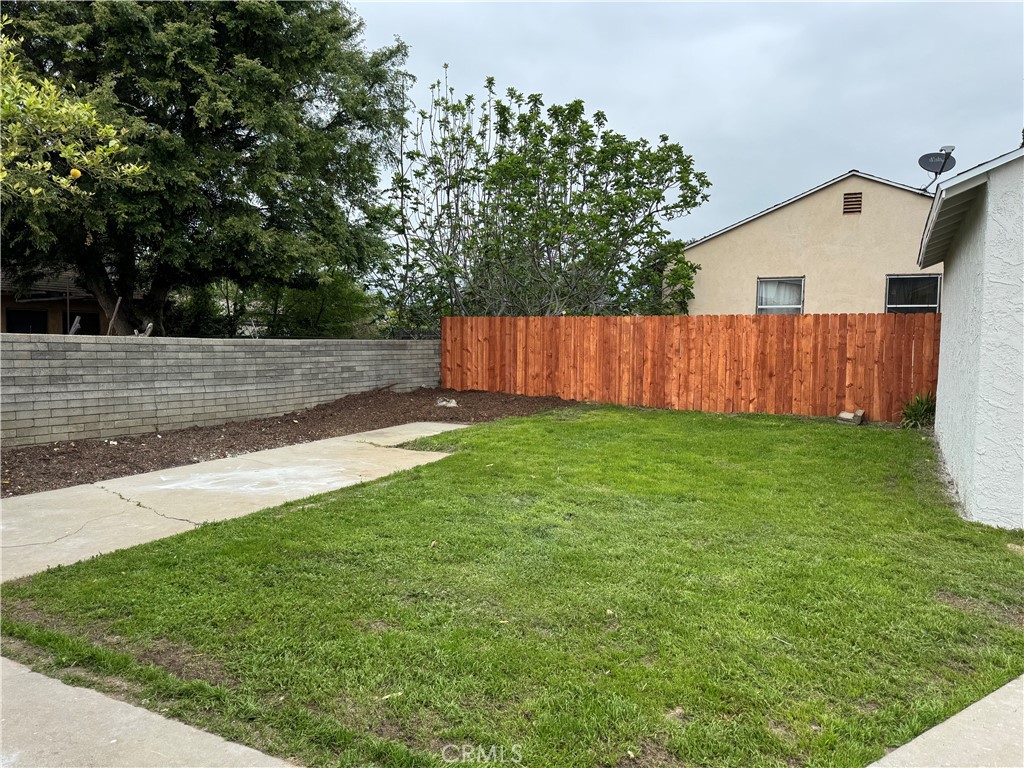 459 Pamela Road Duarte, CA 91010 - Photo 4 of 18 a view of a backyard with a garden