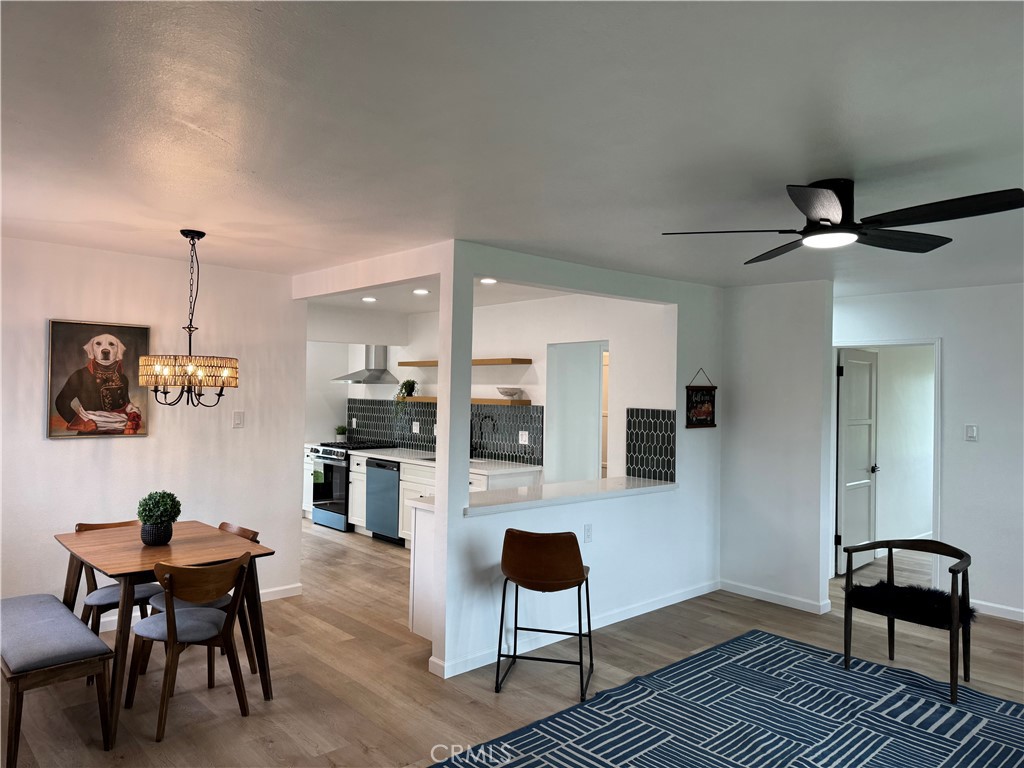 459 Pamela Road Duarte, CA 91010 - Photo 7 of 18 a living room with furniture a rug and a flat screen tv