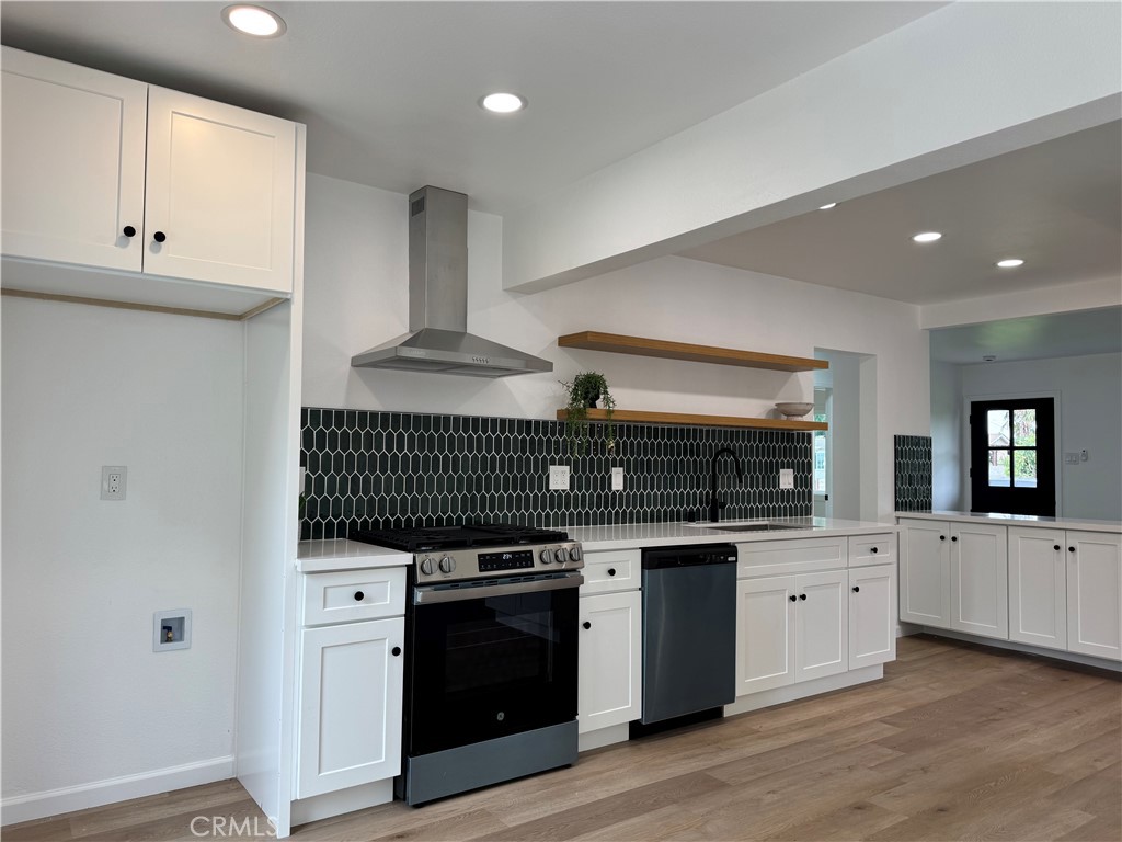 459 Pamela Road Duarte, CA 91010 - Photo 9 of 18 a kitchen with stainless steel appliances granite countertop a stove and cabinets