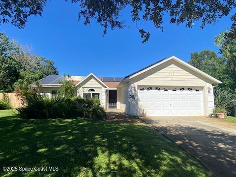 906 Black Pine Court Rockledge, FL 32955 - Photo 1 of 27 a view of house with yard and green space