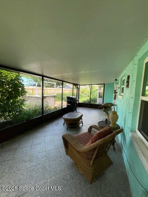 906 Black Pine Court Rockledge, FL 32955 - Photo 23 of 27 a living room with furniture and a large window