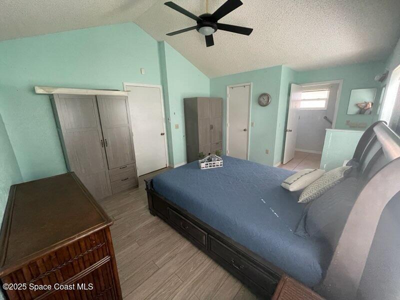 906 Black Pine Court Rockledge, FL 32955 - Photo 10 of 27 a bedroom with a bed and window