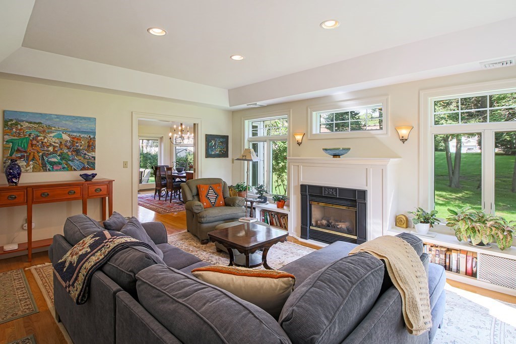 54 Ellis Drive Worcester, MA 01609 - Photo 16 of 42 a living room with furniture and a fireplace