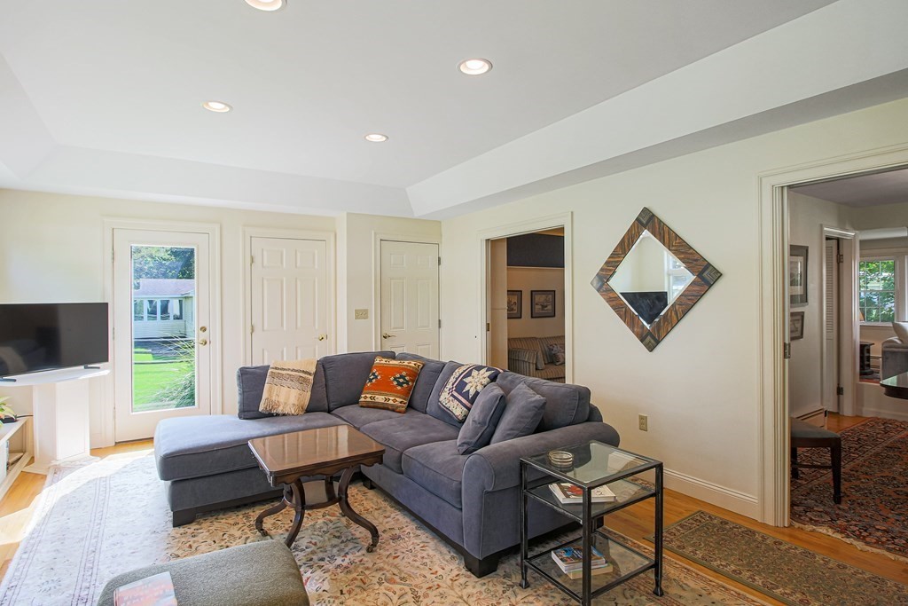 54 Ellis Drive Worcester, MA 01609 - Photo 17 of 42 a living room with furniture and a flat screen tv