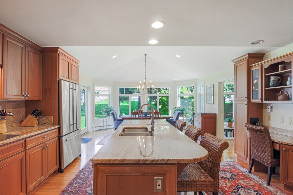 54 Ellis Drive Worcester, MA 01609 - Photo 20 of 42 a kitchen with stainless steel appliances granite countertop a sink stove and refrigerator