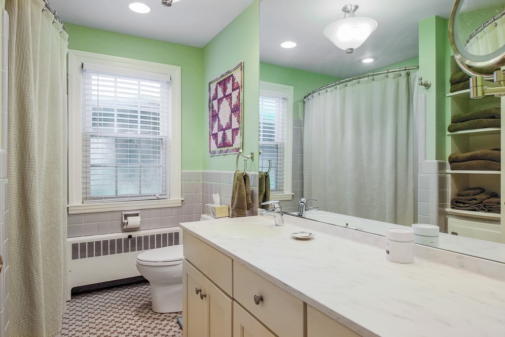 54 Ellis Drive Worcester, MA 01609 - Photo 39 of 42 a bathroom with a sink a toilet and shower