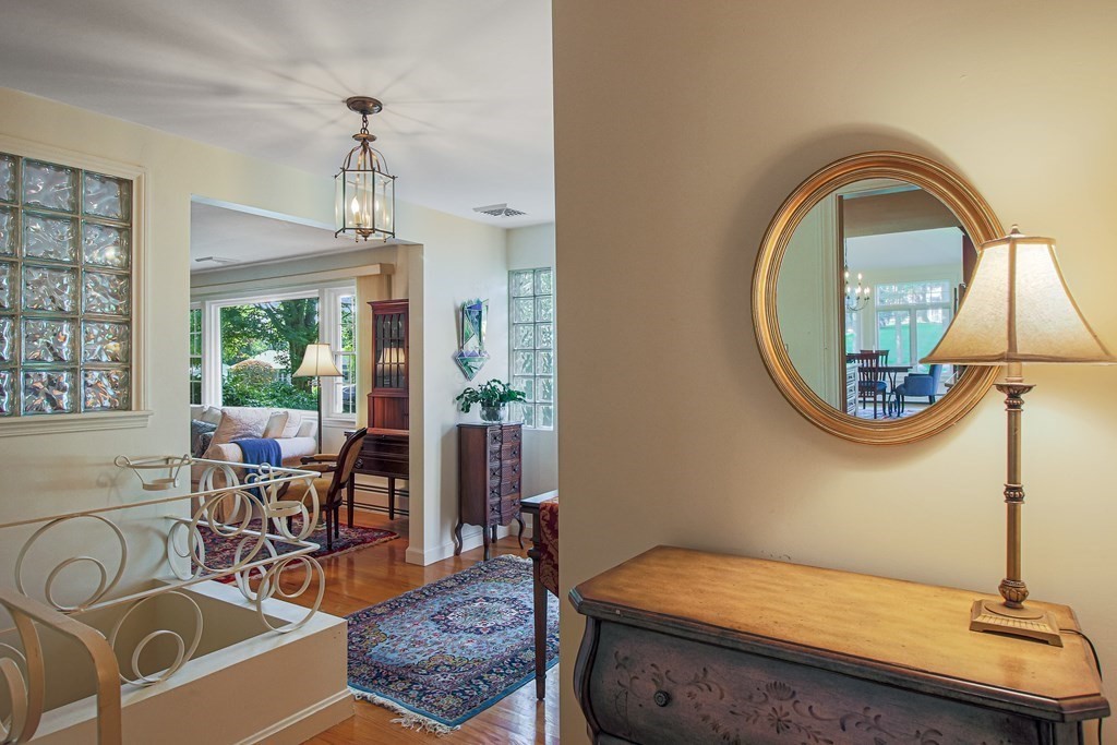 54 Ellis Drive Worcester, MA 01609 - Photo 6 of 42 a bedroom with a bed a lamp and a window