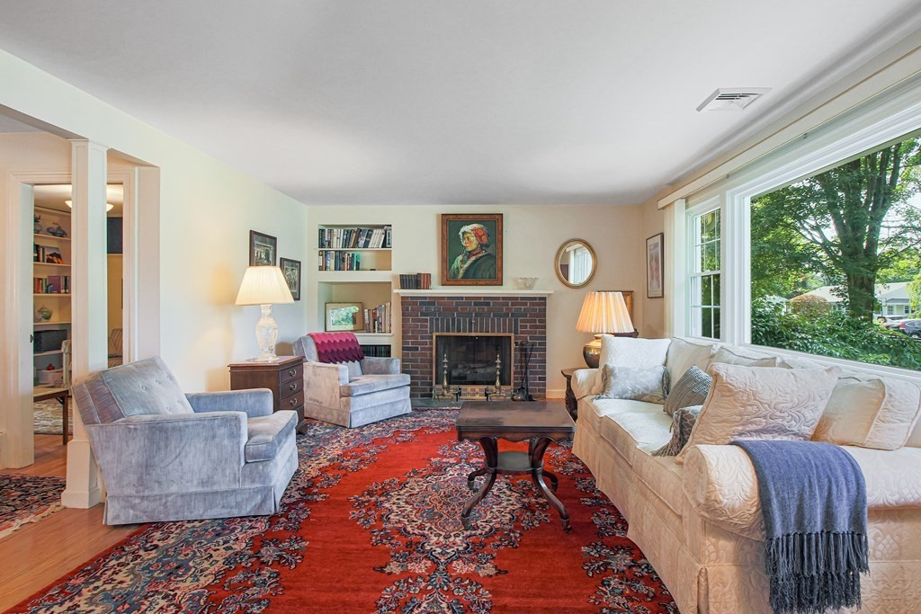 54 Ellis Drive Worcester, MA 01609 - Photo 9 of 42 a living room with furniture and a fireplace