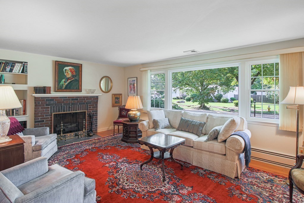 54 Ellis Drive Worcester, MA 01609 - Photo 10 of 42 a living room with furniture and a fireplace