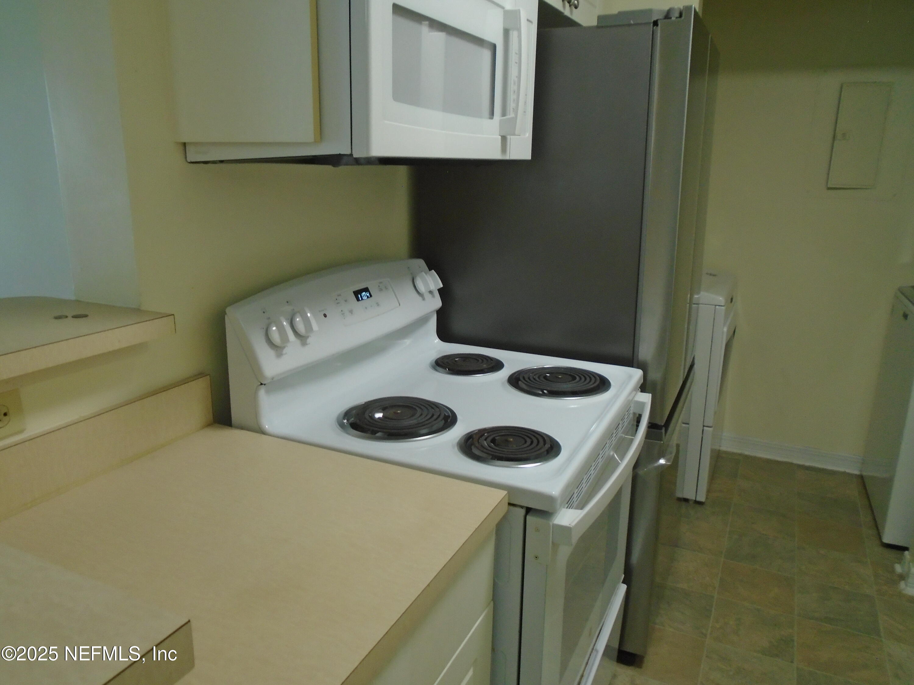 10200 Belle Rive Boulevard, Unit 163 Jacksonville, FL 32256 - Photo 5 of 13 a utility room with dryer and washer